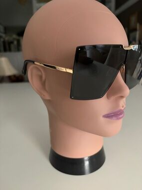 MaxMara Black Shield Sunglasses with Gold Accent